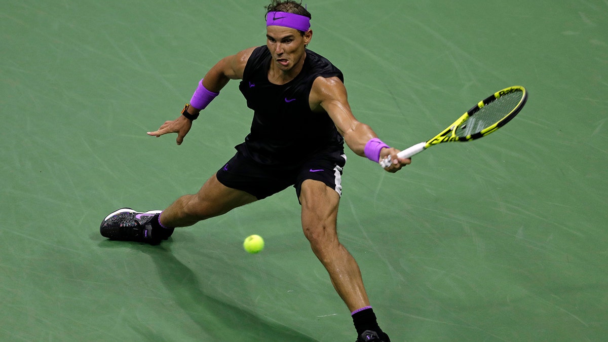 Rafael Nadal, of Spain, hits a return to Diego Schwartzman, of Argentina, during the quarterfinals of the U.S. Open tennis tournament Wednesday, Sept. 4, 2019, in New York. (AP Photo/Adam Hunger)