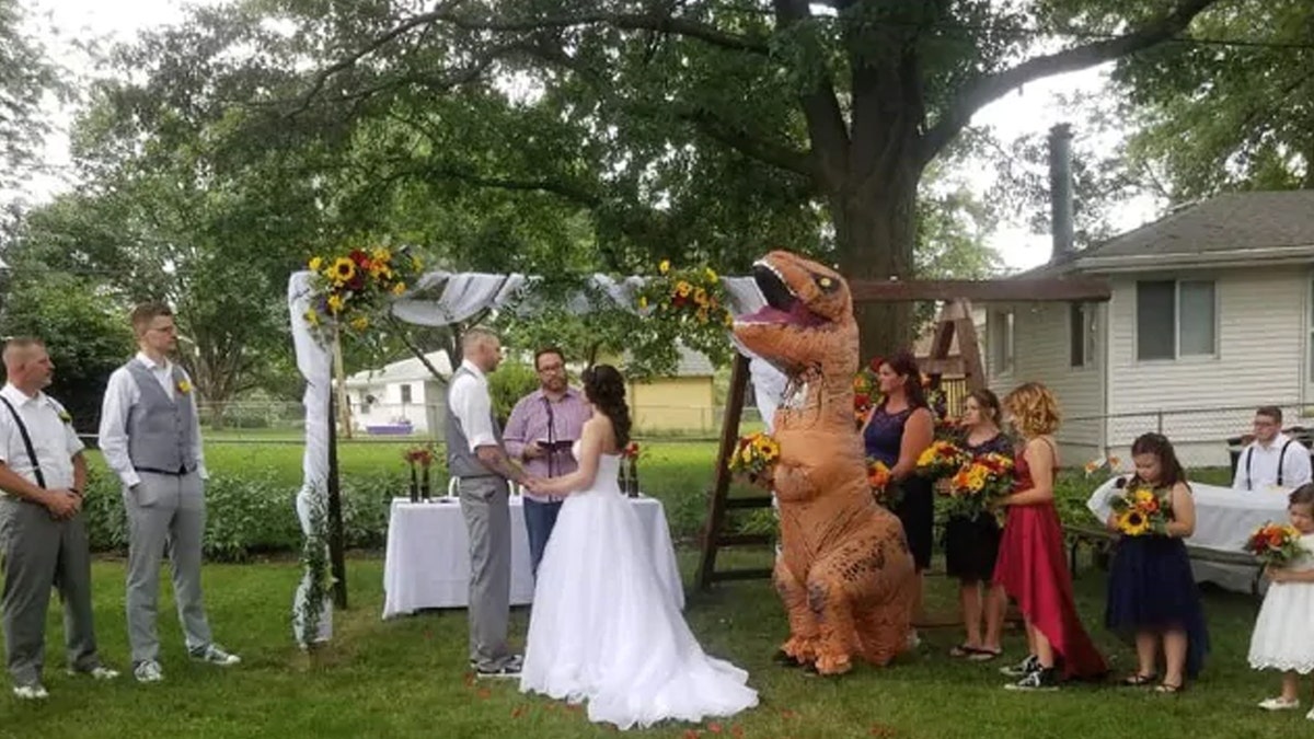 “It was hot!” Meador said of wearing full-body costume to the outdoor August nuptials.