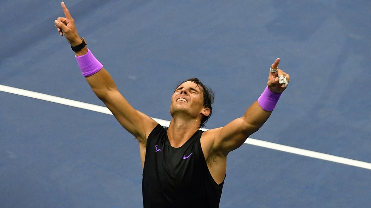 Rafael Nadal celebrating after he beat Daniil Medvedev in five sets.