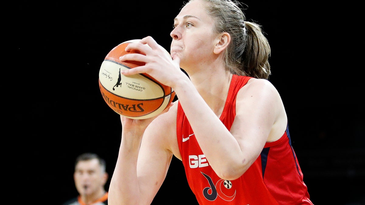 Washington Mystics' Emma Meesseman shoots against the Las Vegas Aces during the second half of Game 4 of a WNBA playoff basketball series Tuesday, Sept. 24, 2019, in Las Vegas. (AP Photo/John Locher)