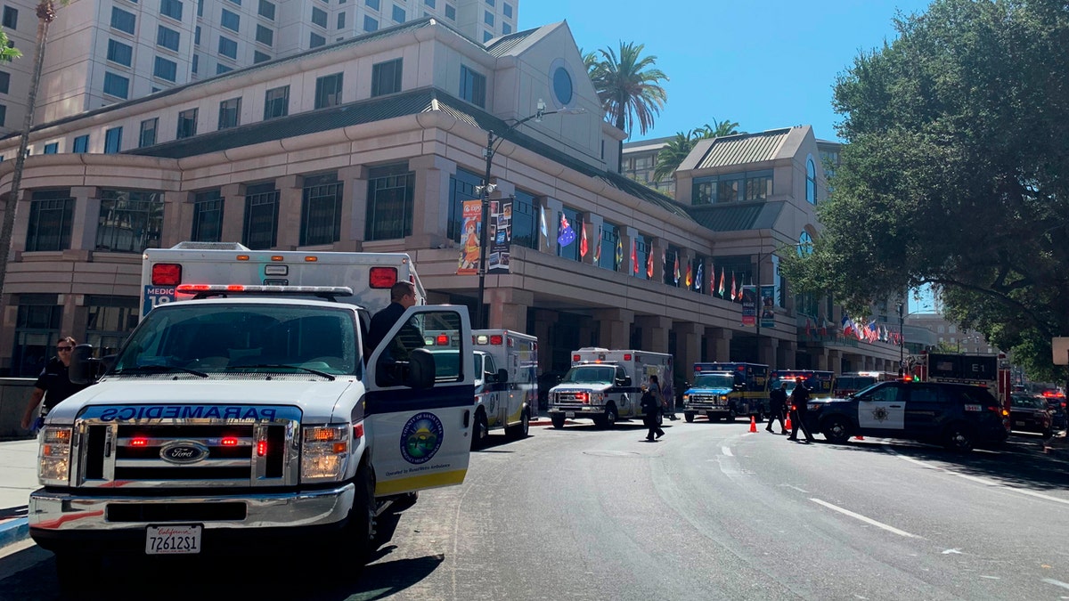 Fire crews gather on Market Street outside the Hotel Fairmont in downtown San Jose, Calif., after a report of a chemical odor Saturday, Aug. 31, 2019.