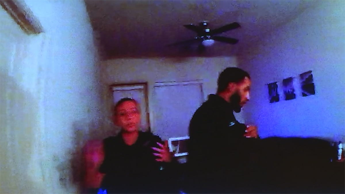 Image from video from Officer Michael Lee`s body camera showing Amber Guyger in Botham Jean`s apartment.