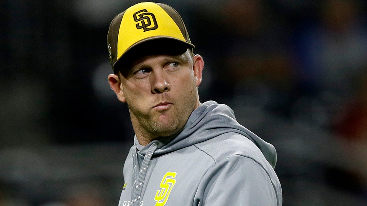 San Diego Padres manager Andy Green walks off the field during Friday night's game against Arizona. (AP Photo/Alex Gallardo)