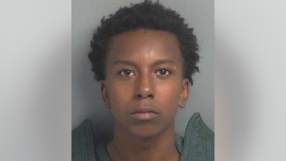 Justice Forney, 17, was charged with tampering with evidence after police say he disposed of the weapon used to kill Romaz Craddock, 17, his stepbrother. 