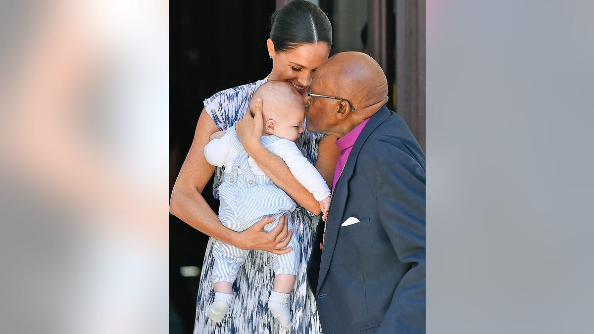 Britain's Duke and Duchess of Sussex, Prince Harry and his wife Meghan Markle hold their baby son Archie as they meet with Archbishop Desmond Tutu at the Tutu Legacy Foundation in Cape Town on Sep. 25, 2019. The British royal couple are on a 10-day tour of southern Africa -- their first official visit as a family since their son Archie was born in May.