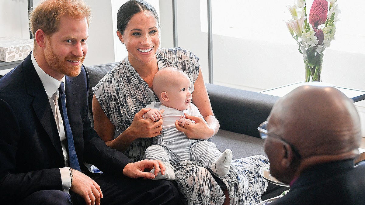 Britain's Duke and Duchess of Sussex, Prince Harry and his wife Meghan Markle hold their baby son Archie as they meet with Archbishop Desmond Tutu at the Tutu Legacy Foundation  in Cape Town on Sep. 25, 2019. The British royal couple are on a 10-day tour of southern Africa -- their first official visit as a family since their son Archie was born in May.