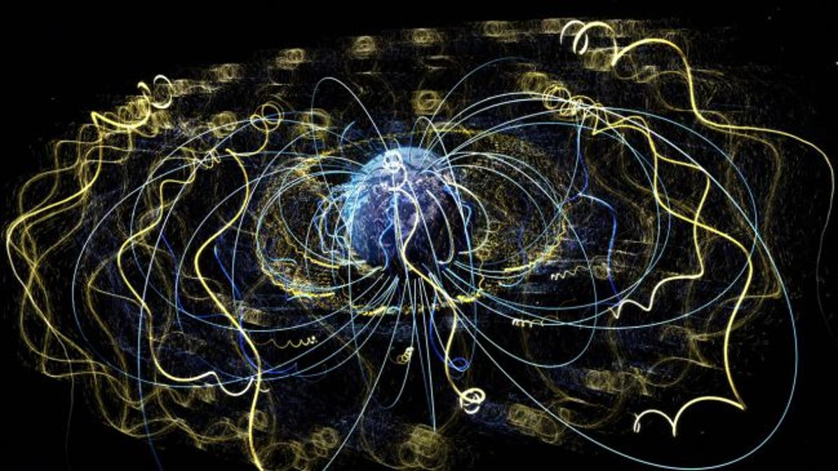Around Earth, an invisible magnetic field traps electrons and other charged particles. (Credit: NASA's Goddard Space Flight Center)