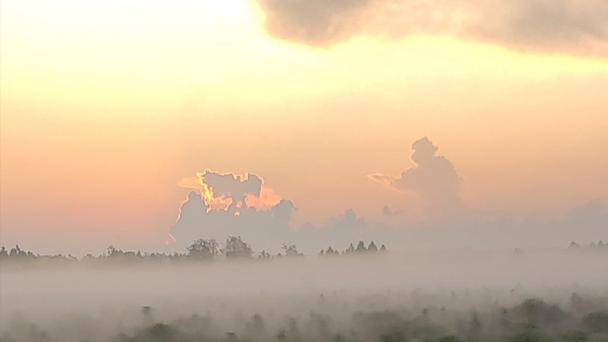 Matt Snow was driving to work on Sept. 11 when he spotted what resembled a firefighter and an angel in the clouds.