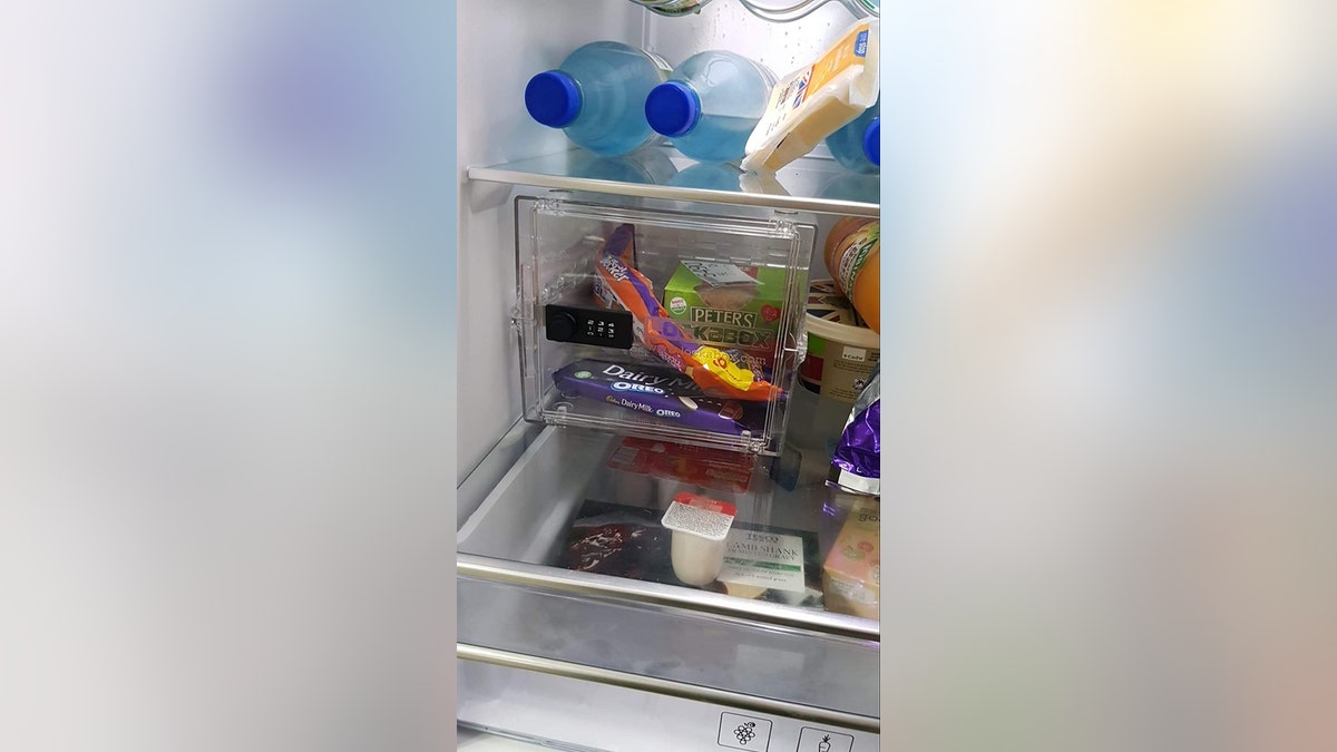 LAIRY MILK! FURIOUS CHOCOLATE ADDICT RETURNS HOME TO FIND HUBBY-TO-BE HAS INSTALLED FRIDGE SAFE TO STOP HER FROM STEALING HIS TREATS