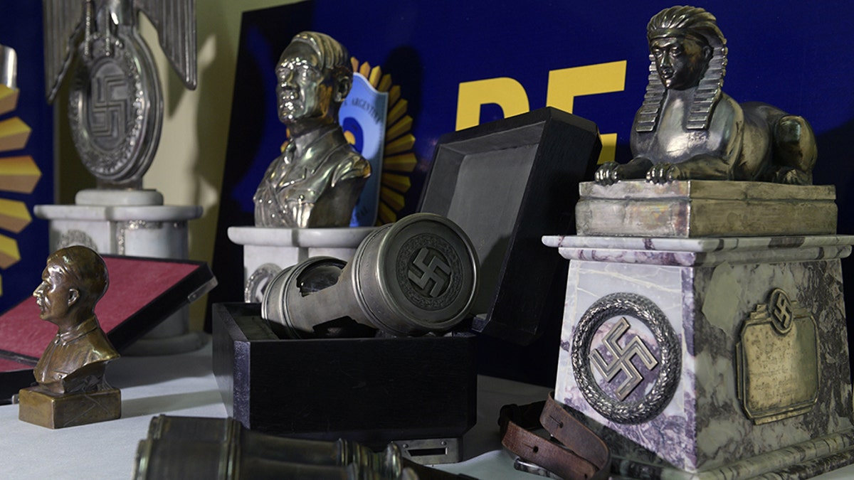 File photo: Some of the 75 pieces of Nazi art seized during an operation carried out on June 9, on the outskirts of Buenos Aires are on display at the Interpol headquarters in Buenos Aires, on June 22, 2017. (Credit: JUAN MABROMATA/AFP/Getty Images)