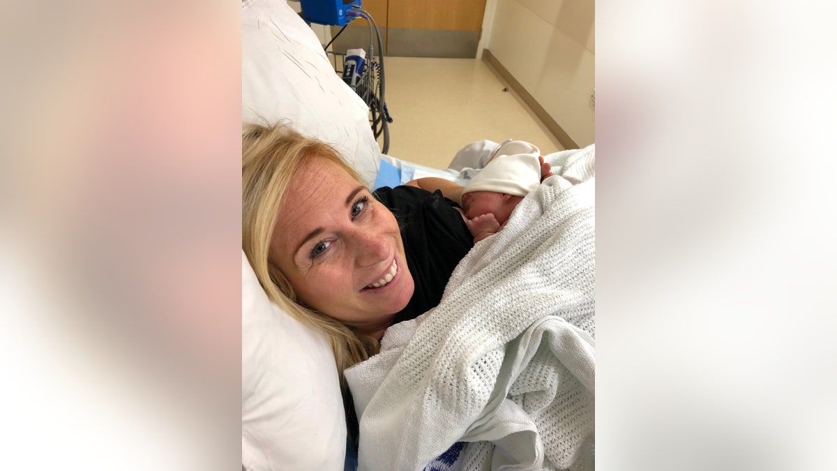 Brooke, pictured with baby Paloma, forced her husband to pull over en route to the hospital.