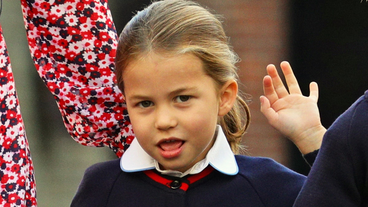 Britain's Princess Charlotte of Cambridge gestures as she arrives for her first day of school at Thomas's Battersea in London on September 5, 2019. (Photo by Aaron Chown / POOL / AFP) (Photo credit should read AARON CHOWN/AFP/Getty Images)