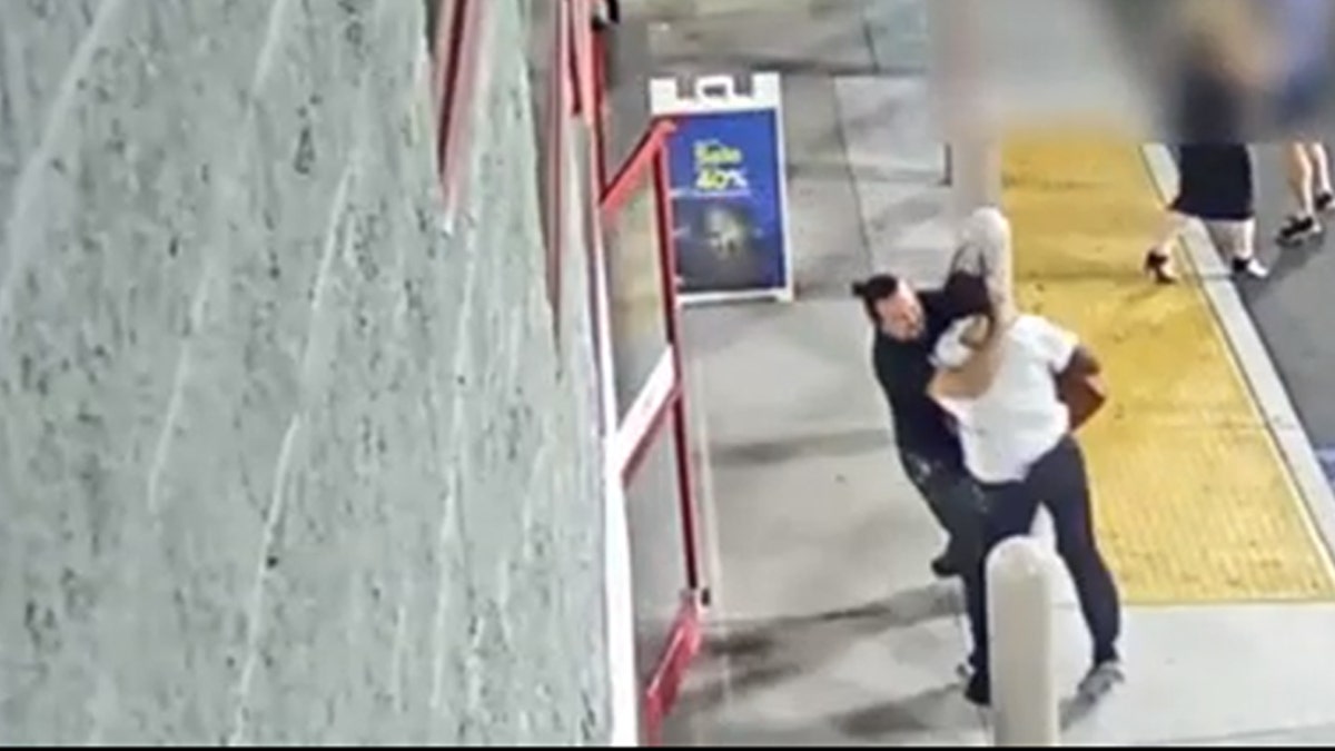 The Best Buy employee is seen on surveillance video chasing the man, trying to stop him before he got out the doors, but as they struggled over the bag, the suspect dragged the employee outside the store and into the parking lot.