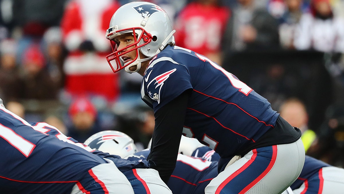 Tom Brady's unusual method of keeping his centers' butts dry