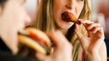 A couple eating fast food in a restaurant