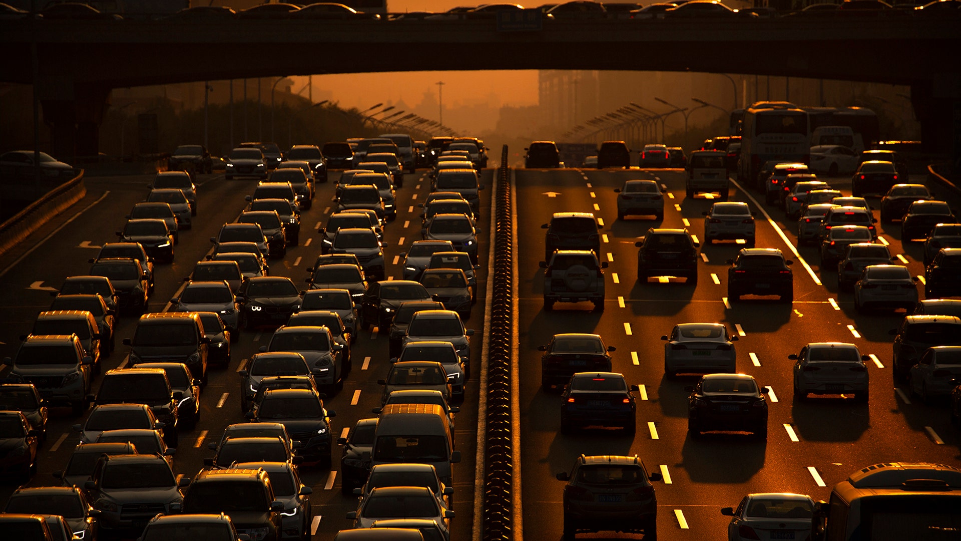 Commuters make their way along an expressway during rush hour in Beijing, Sept. 6, 2019. 