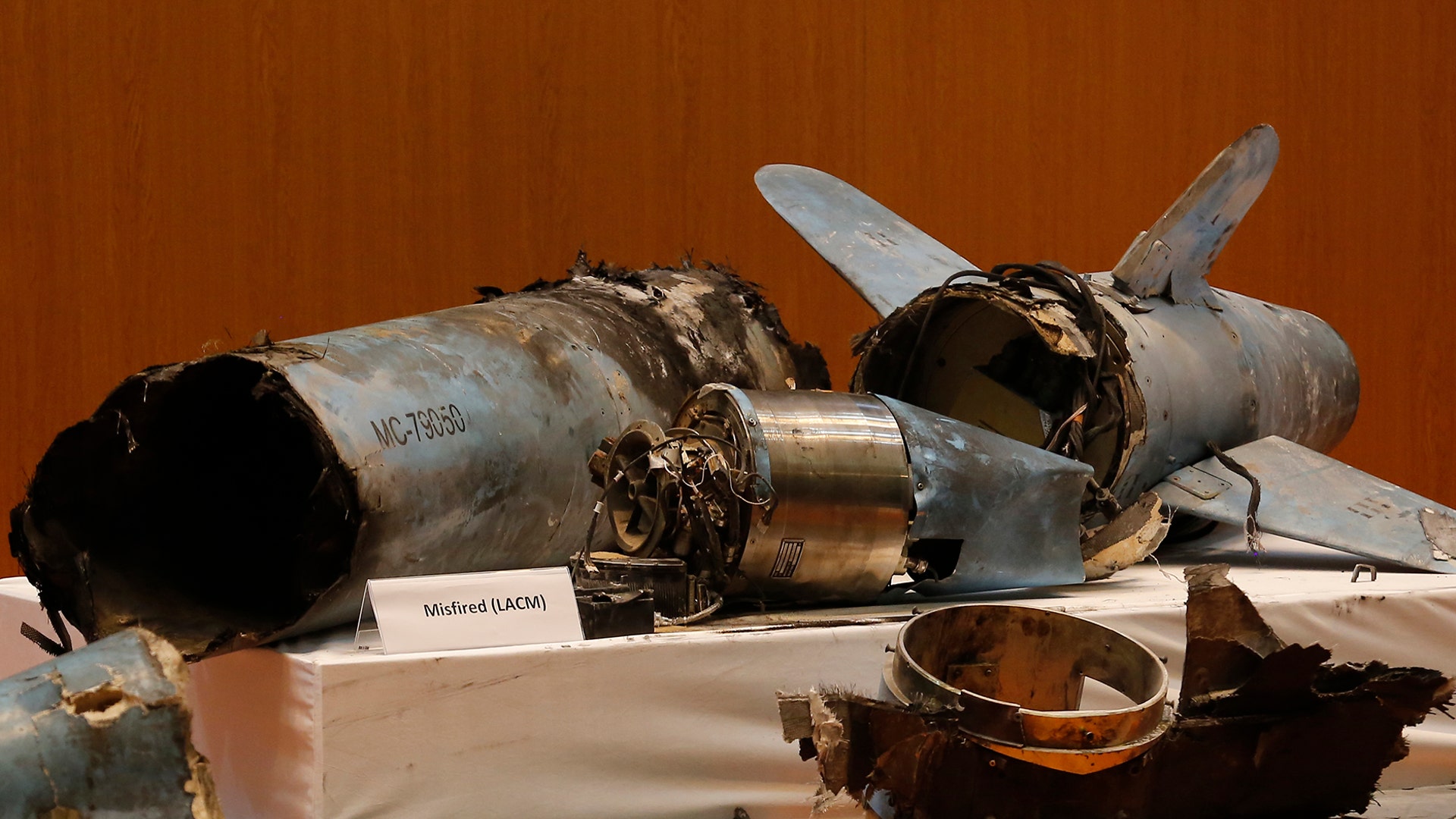 Remains of what was described as a misfired cruise missile used in an attack that targeted the heart of Saudi Arabia's oil industry is displayed during a press conference by Saudi military in Riyadh, Saudi Arabia, Sept. 18, 2019. 