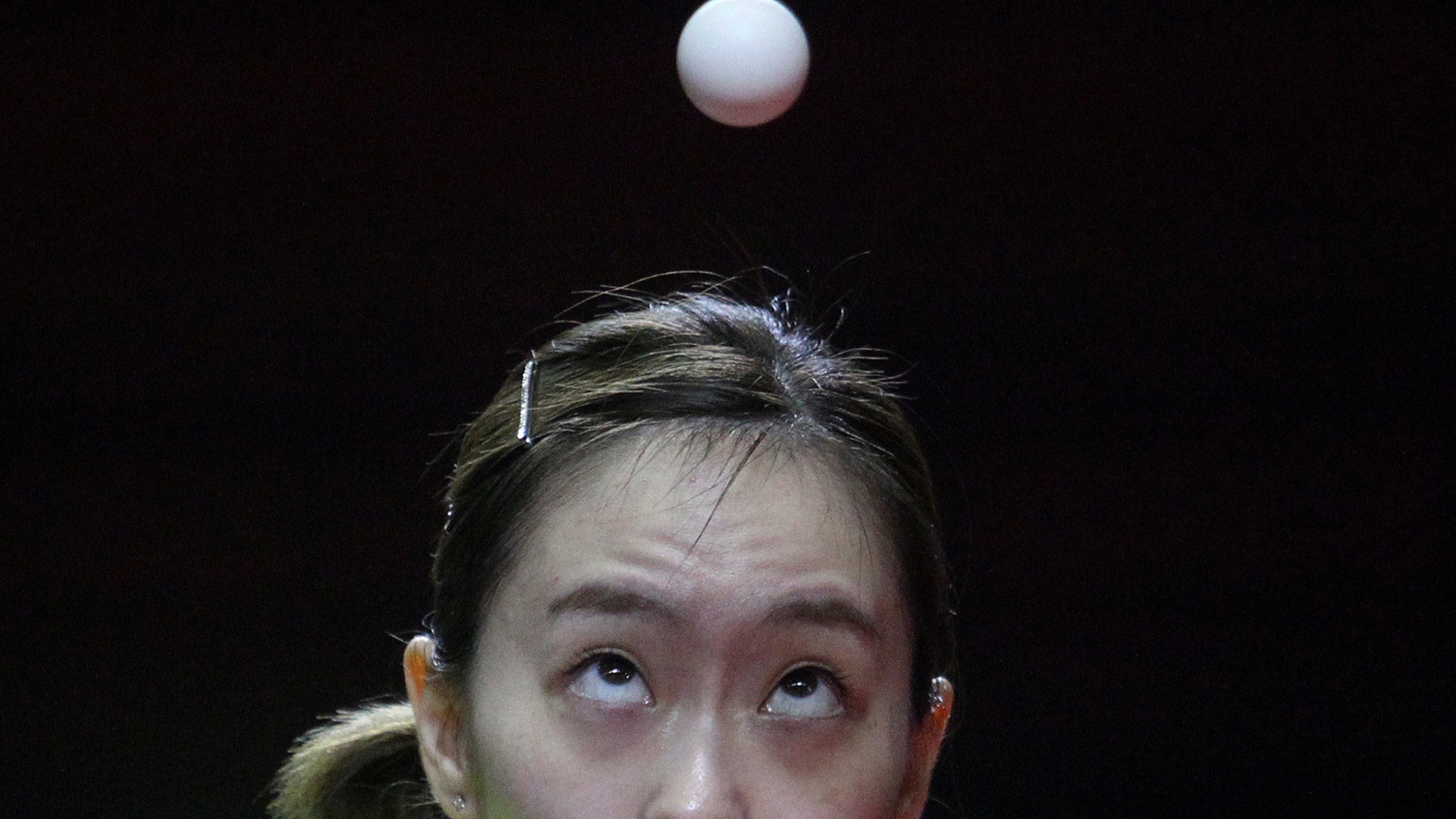 Japan's Kasumi Ishikawa plays against China's Chen Meng during their women's team table tennis final match at the ITTF-ATTU Asian Table Tennis Championships in Yogyakarta, Indonesia, Sept. 17, 2019. 