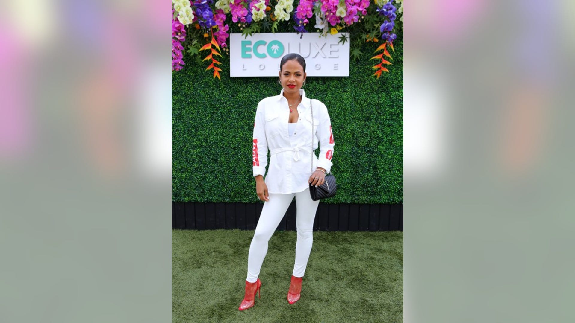 Pregnant "Falling Inn Love" star Christina Milian glowed in a chic, white ensemble as she attended Debbie Durkin’s EcoLuxe Lounge sponsored by Oli Cosmetics ReGen De Peau, The Spa Dr. and SoCalHempCo at The Beverly Hilton in Beverly Hills, Calif. on Sept. 21, 2019.