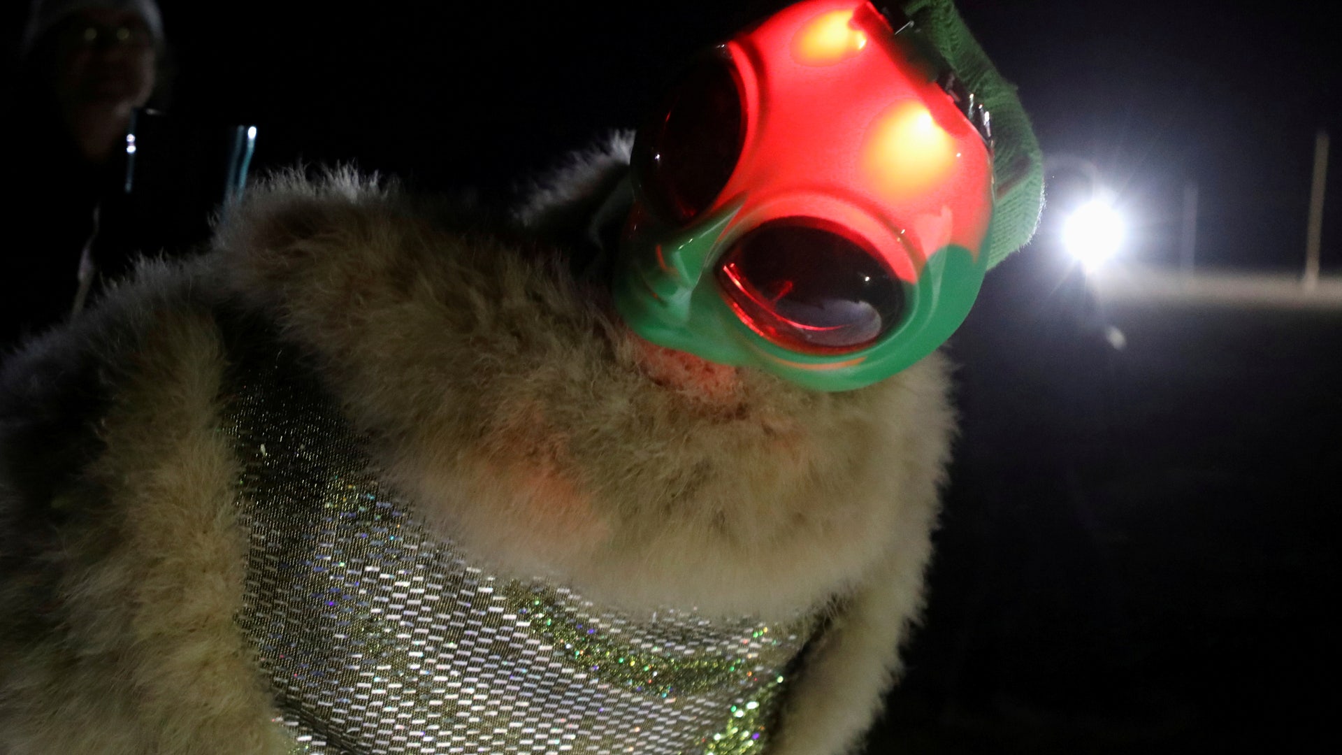 Attendees wear space travel and alien themed costumes as an influx of tourists responding to a call to 'storm' Area 51, a secretive U.S. military base . September 19, 2019. REUTERS/Jim Urquhart 