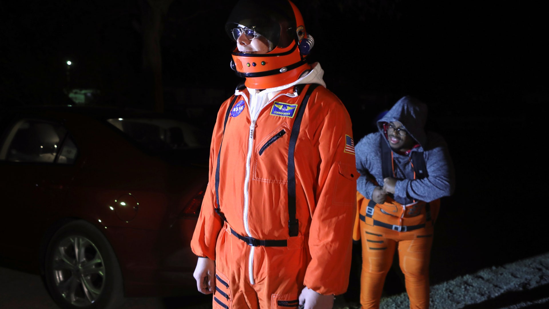 Attendees wear space travel and alien themed costumes as an influx of tourists responding to a call to 'storm' Area 51, a secretive U.S. military base believed by UFO enthusiasts to hold government secrets about extra-terrestrials, is expected in Rachel, Nevada, U.S. September 19, 2019. REUTERS/Jim Urquhart - 