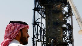 Saudi Arabia shows media scorched oil facility site hit by drones