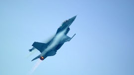 Belgian F-16 fighter jet crashes in France; pilot trapped hanging from power line