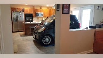 Florida man parks Smart car in kitchen to protect against Hurricane Dorian