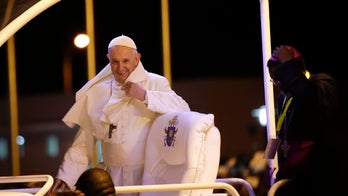 Pope Francis calls it an an 'honor' to be attacked by church conservatives