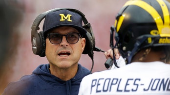 Michigan's Jim Harbaugh disappointed with Big Ten decision to put college football on hold