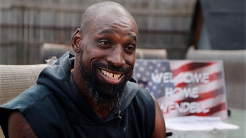 Former college football player returns to US after serving 3 years in China prison over bar fight