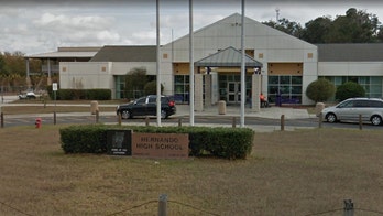 Possible gun sale at Florida high school triggers arrests