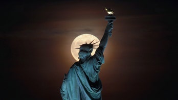 Friday the 13th harvest moon thrills skywatchers