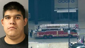 Man charged with terrorism after driving SUV through shopping mall in Chicago suburb, officials say