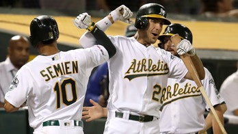 Oakland Athletics fan invades outfield, manages to escape security guards