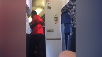 'Mile high club' couple annoys passengers waiting for airplane bathroom: 'I couldn’t believe my eyes'