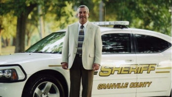 North Carolina sheriff indicted in plot to kill former deputy over racially charged recording