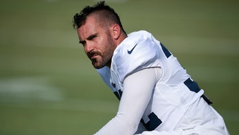 Los Angeles Rams' Eric Weddle left bloodied after taking flying knee to the head