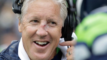 Seattle Seahawks' Pete Carroll receives nasty gash to nose after getting hit with football