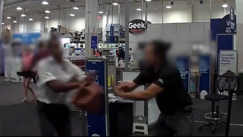 Armed robber caught on video in struggle with Los Angeles Best Buy employee: cops