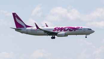 Swoop airline passengers wrote 'goodbye messages' after engine caught on fire due to bird strike