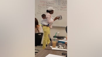College professor carries student’s baby in class for 3 hours, goes viral