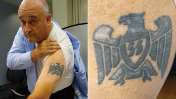 White ATF supervisor with Nazi arm tattoo discriminated against black agent, lawsuit claims 