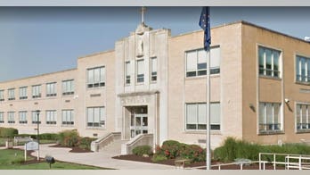 Justice Department sides with Catholic archdiocese that fired gay teacher