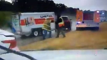 2 Oklahoma firefighters struck by hydroplaning U-Haul trailer at scene of crash, video shows