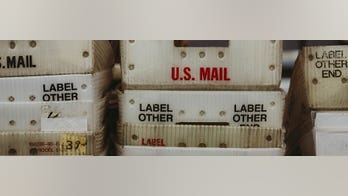 Cash-strapped Postal Service 'in peril' without intervention from Congress: watchdog