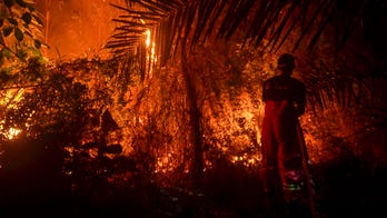 Indonesia fires turn sky an eerie blood red