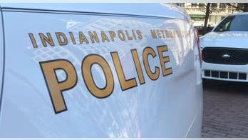 Indianapolis cop accused of punching student facing criminal charges, prosecutors say