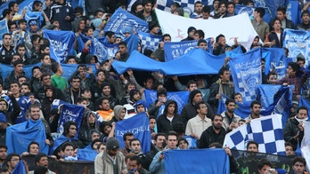 Iranian female soccer fan 'blue girl' dies after setting herself on fire