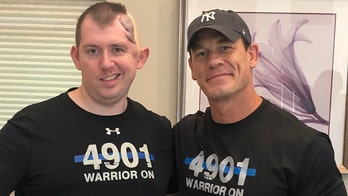 John Cena visits injured Colorado Springs police officer